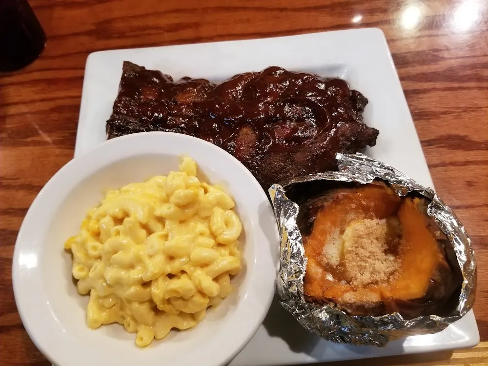 Half Slab of Ribs with Baked Sweet Potato and Mac and Cheese